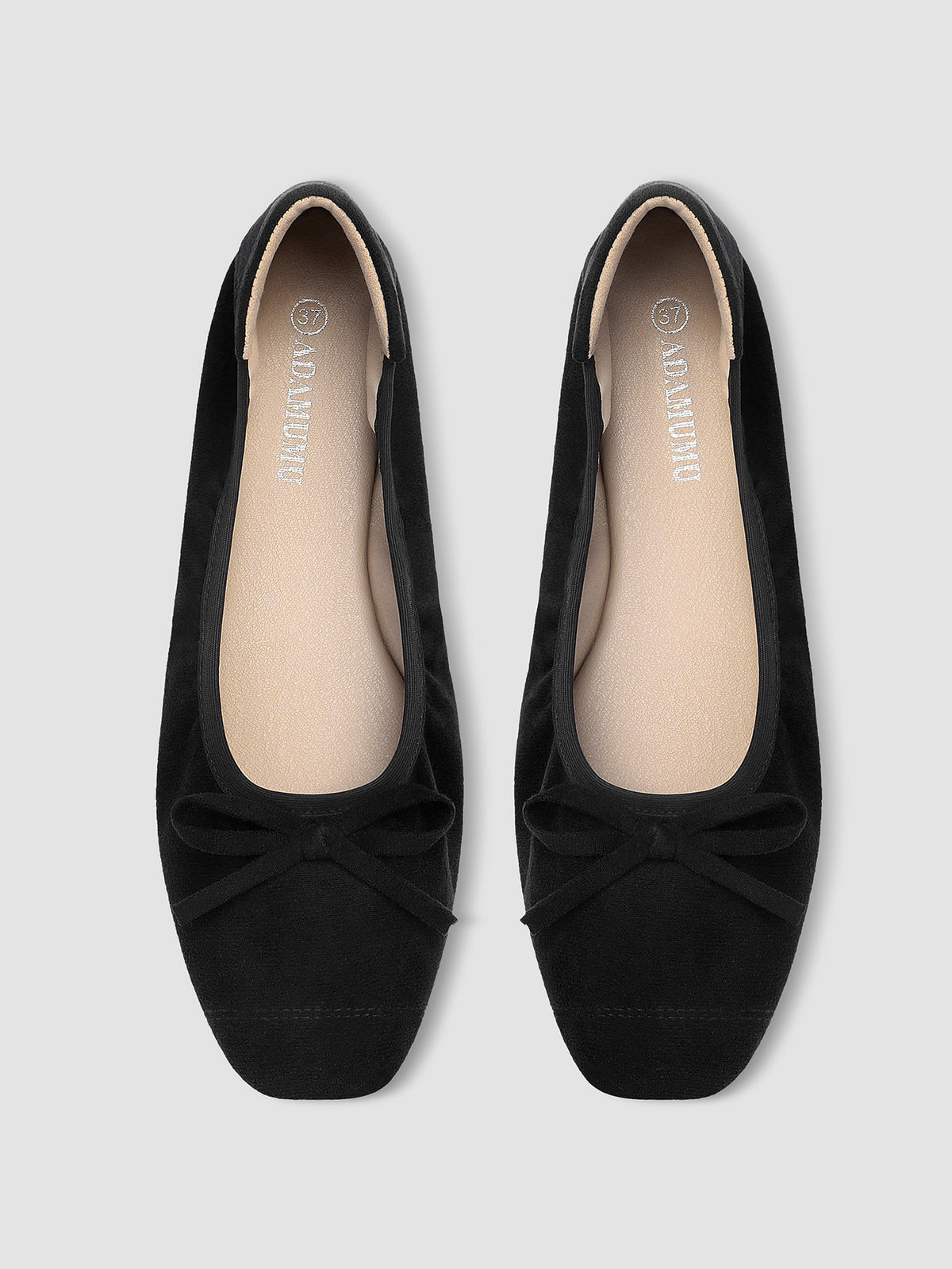 Bow tie pointed-toe shoes